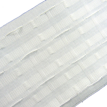 Close-up of white extra wide curtain tape on a white background