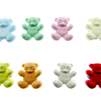 Colorful teddy bear-shaped candies on a white background