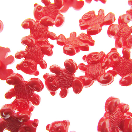 Red gummy bears on a white background