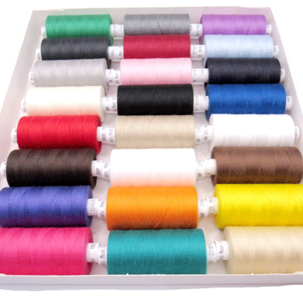 Set of bright Coats Moon sewing threads in a white background