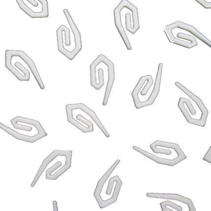 White plastic curtain hooks on a white background