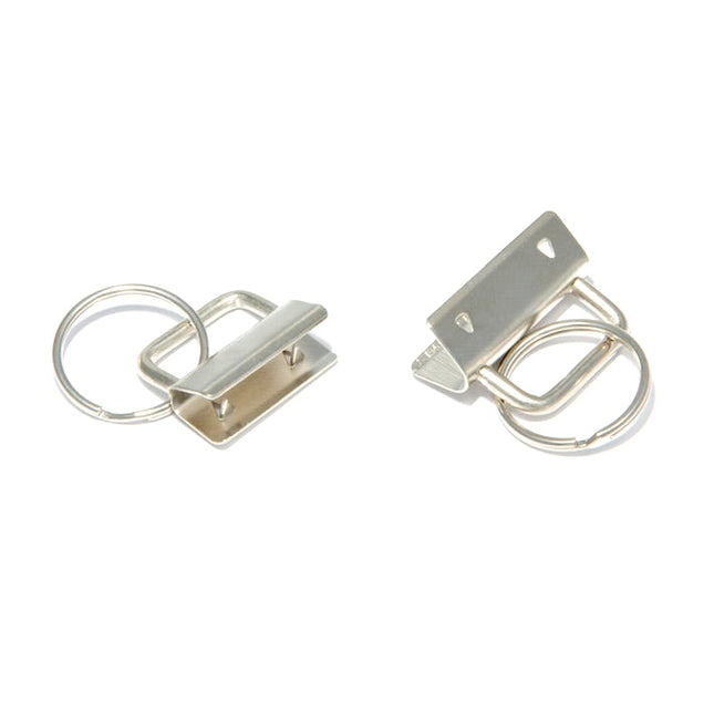 Two key fob split rings, one larger at 25mm and one smaller at 32mm, made of metal with a brushed finish, displayed against a white background.