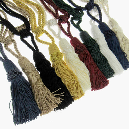 Set of colorful curtain tie back tassels on a white background