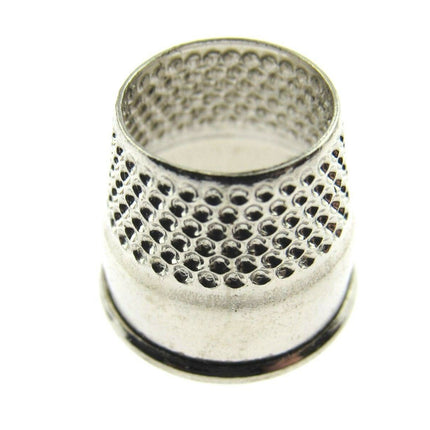 A stainless steel open end tailors thimble on a white background