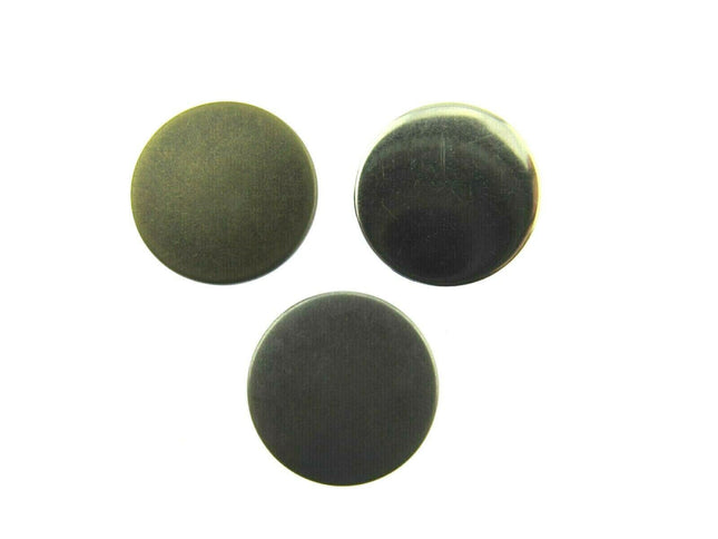 17mm no sew hammer home jean buttons in silver, gunmetal or antique brass sitting side by side in a row