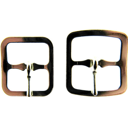 A pair of silver coloured shoe or kilt buckles on a white background